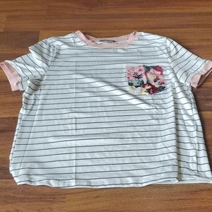 Black and white striped shirt with floral pocket